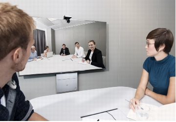 Figure 1. Cisco TelePresence SX20 Quick Set in a Small Meeting Room Environment